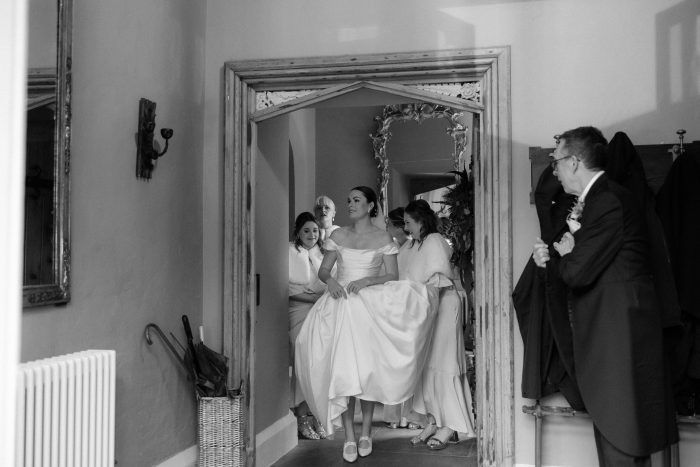 Alice wearing Scarlet by Maggie Sottero with her bridesmaids and the mother of the bride
