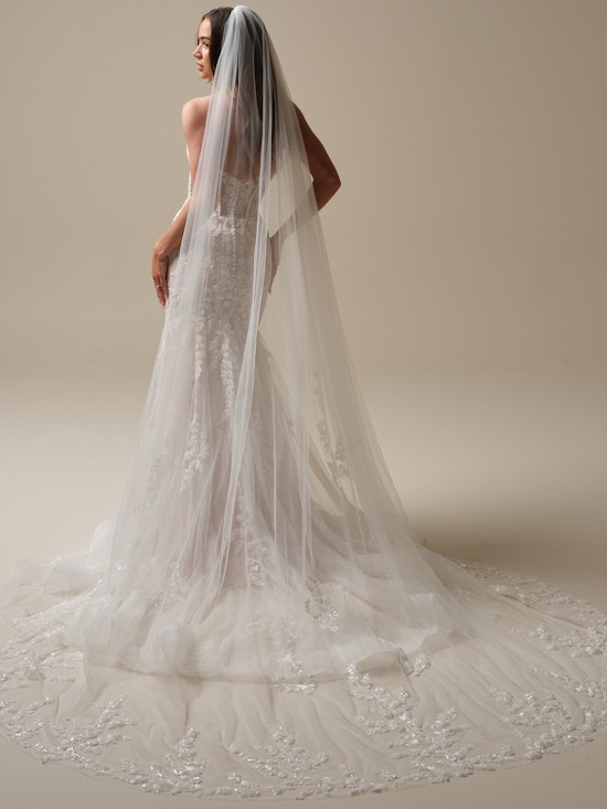 Bride wearing Benjie Chapel-length Veil