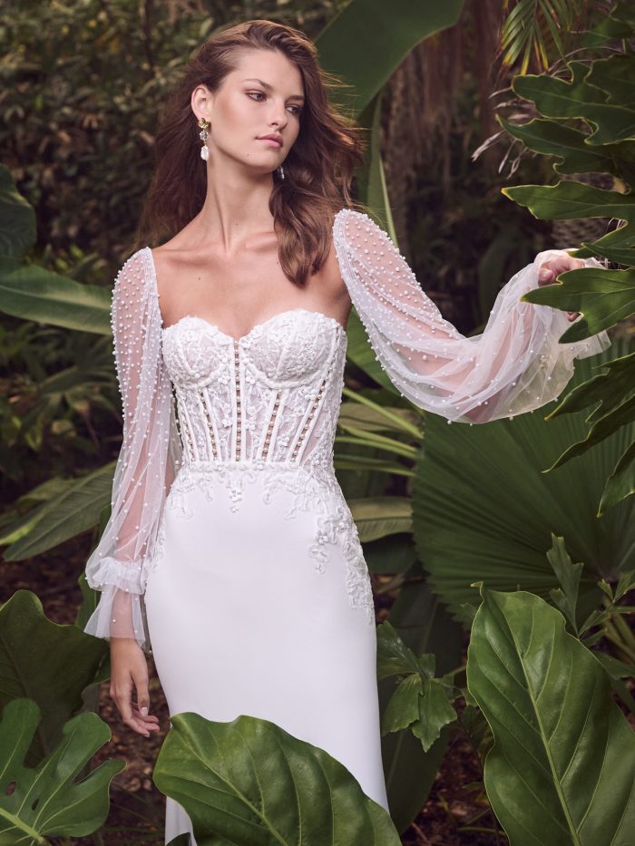Bride wearing pearl wedding dress called Doritte by Maggie Sottero