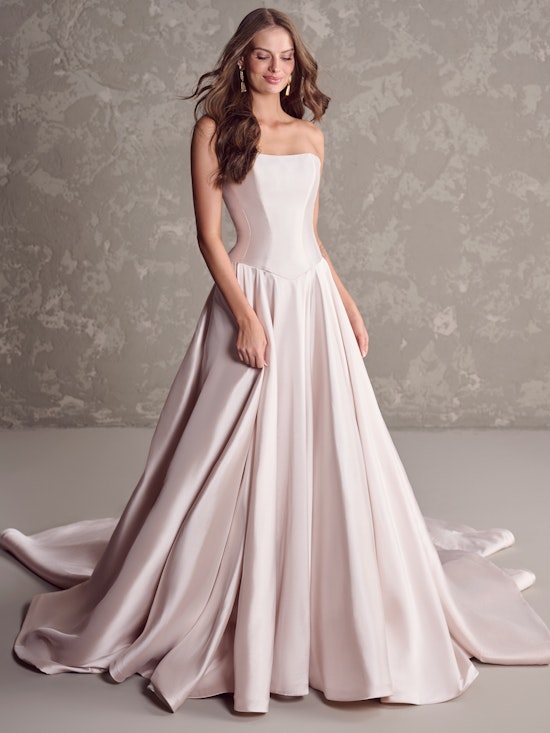 Bride wearing drop waist wedding dress Emmanuelle by Maggie Sottero