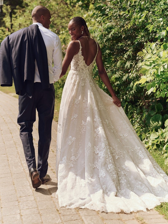 Bride wearing pearl wedding dress called Jerrica by Maggie Sottero