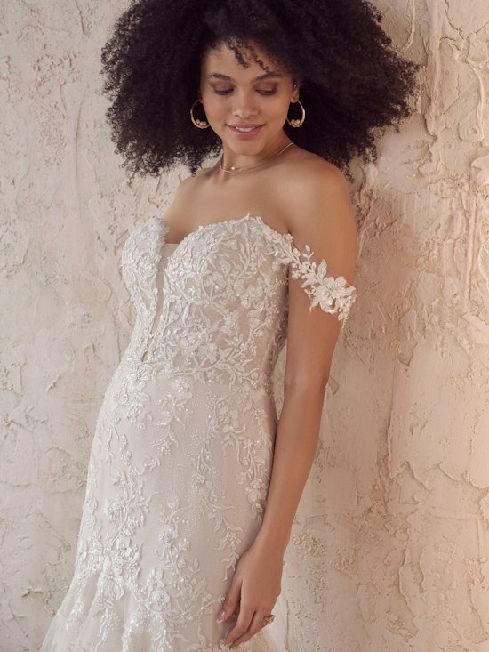 Bride wearing Lennon by Maggie Sottero at a bridal boutique