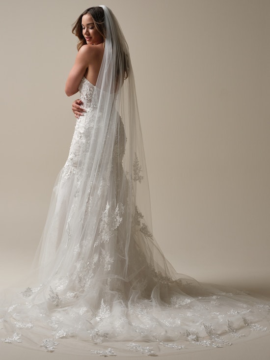 Bride wearing pearl wedding dress called Roberta by Maggie Sottero