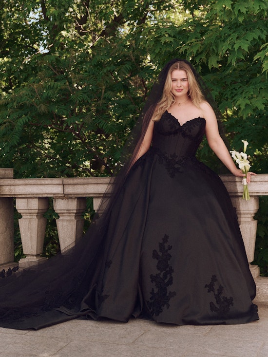 Bride wearing drop waist wedding dress Serafina by Maggie Sottero