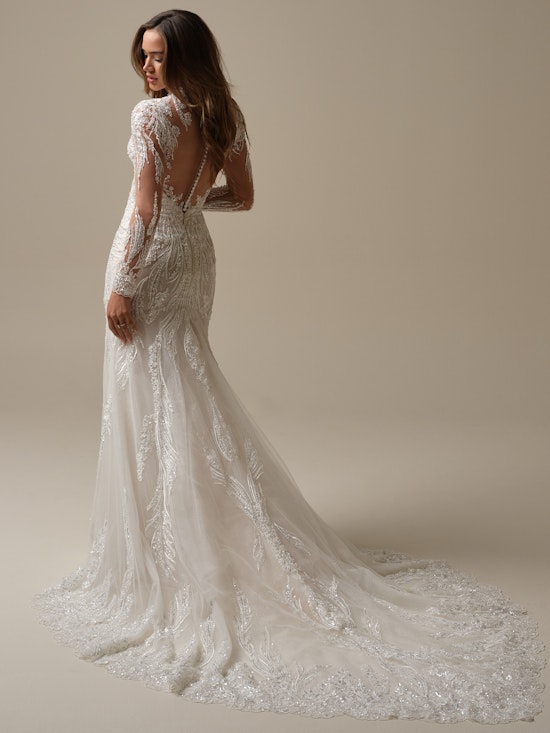 Bride wearing pearl wedding dress called Torrence by Maggie Sottero