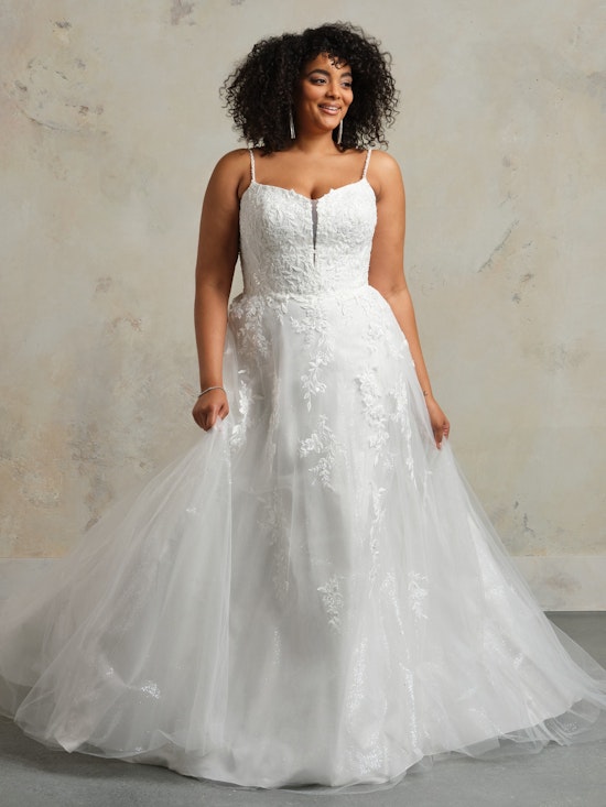Bride wearing Catherine by Rebecca Ingram at a bridal boutique