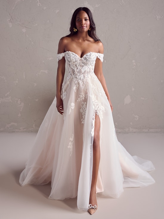 Bride wearing pearl wedding dress called Janice by Rebecca Ingram