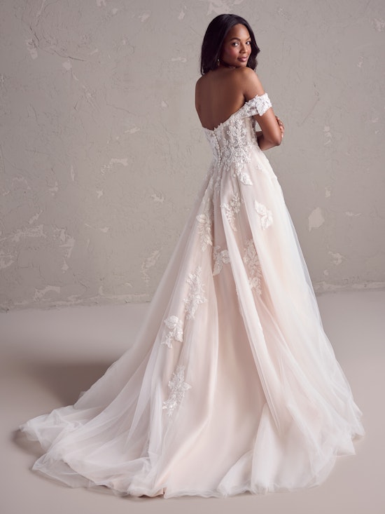 Bride wearing pearl wedding dress called Janice by Rebecca Ingram