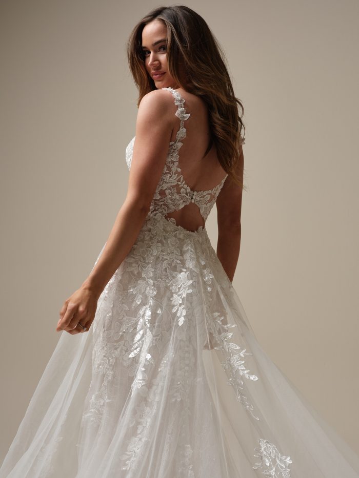 Bride wearing one of our Maggie Sottero wedding dresses called Adrian by Sottero and Midgley