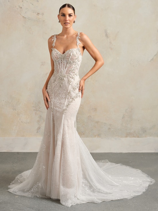 Bride wearing a fit and flare sparkly wedding dress with a sweetheart neckline