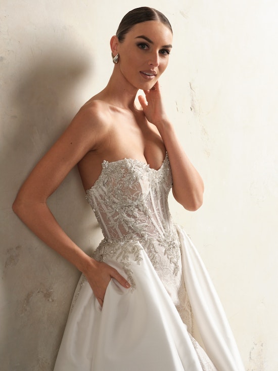 Bride wearing drop waist wedding dress Almudena by Sottero and Midgley
