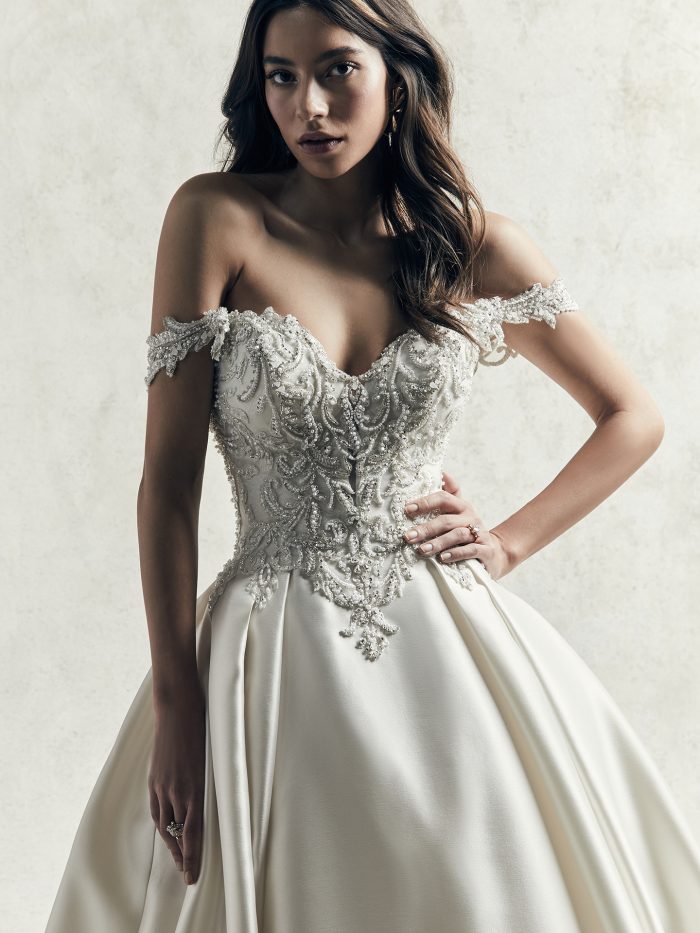 Bride wearing drop waist wedding dress Kimora by Sottero and Midgley