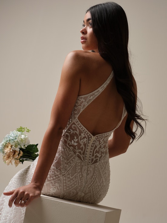 Bride wearing pearl wedding dress called Rhett by Sottero and Midgley