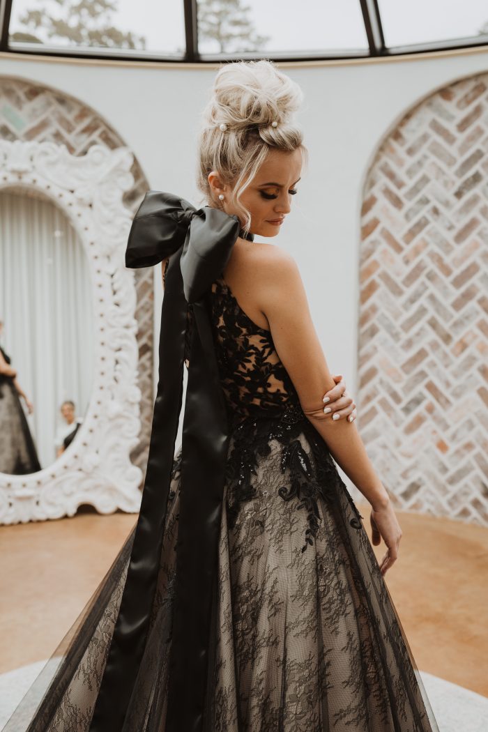 Bride wearing Zander wedding gown by Sottero and Midgley, which works wonderfully for winter wedding themes