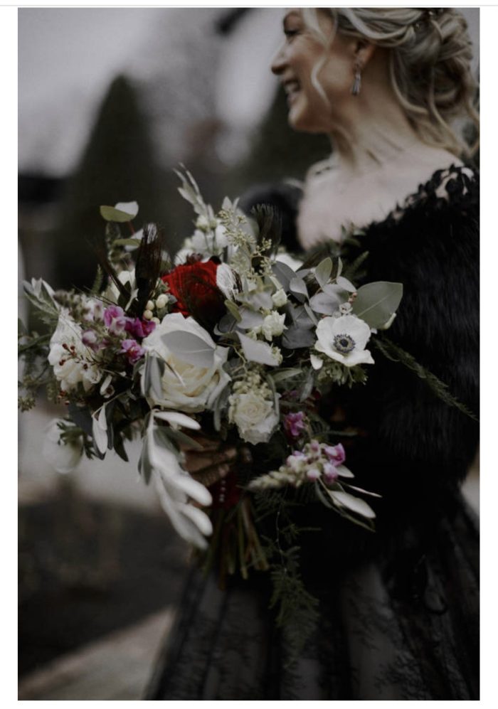Bride wearing Zander wedding gown by Sottero and Midgley