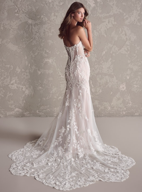 Bride wearing one of our Maggie Sottero wedding dresses called Tanica by Sottero and Midgley