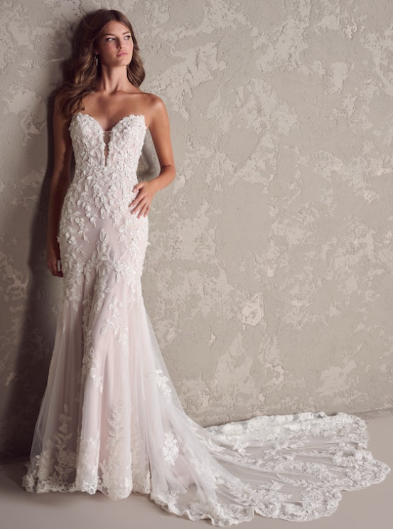 Bride wearing one of our Maggie Sottero wedding dresses called Tanica by Sottero and Midgley